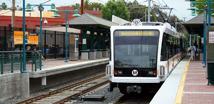 Metro train arriving at a station platform.